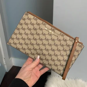 Authentic Michael Kors signature print brown large zippy pouch clutch