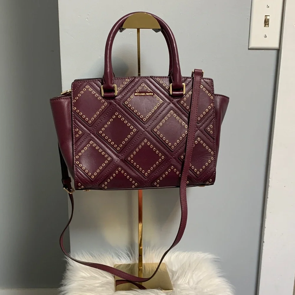 Authentic Michael Kors plum purple leather bag w long strap and gold studs