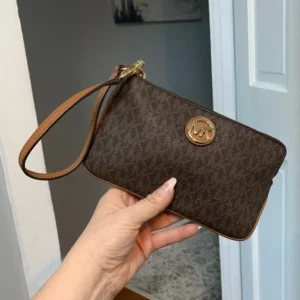 Authentic Michael Kors signature print brown zippy wristlet
