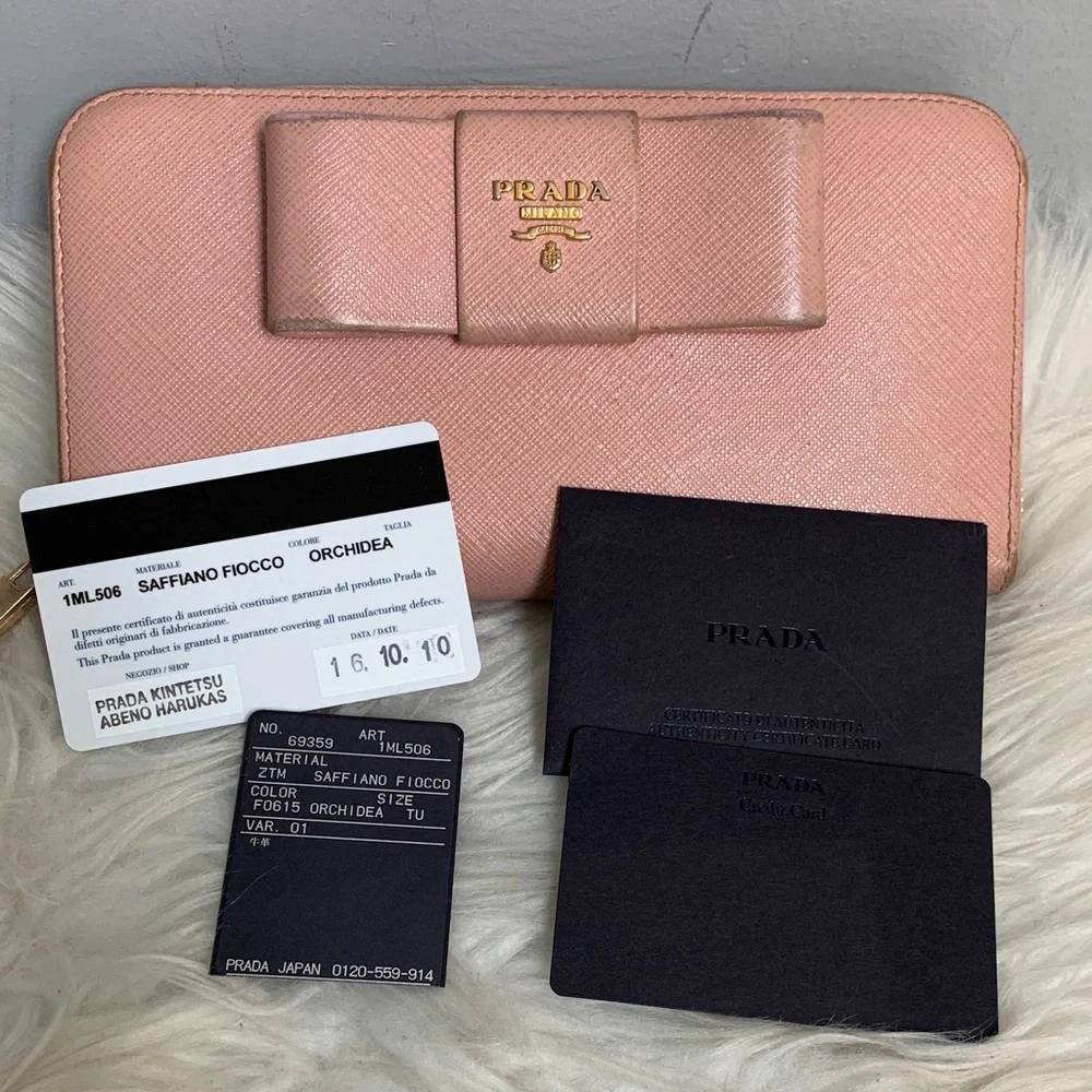 Authentic Prada pink saffiano leather large zippy wallet