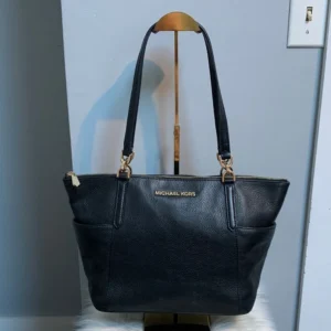 Authentic Michael Kors black leather tote bag with two exterior pockets