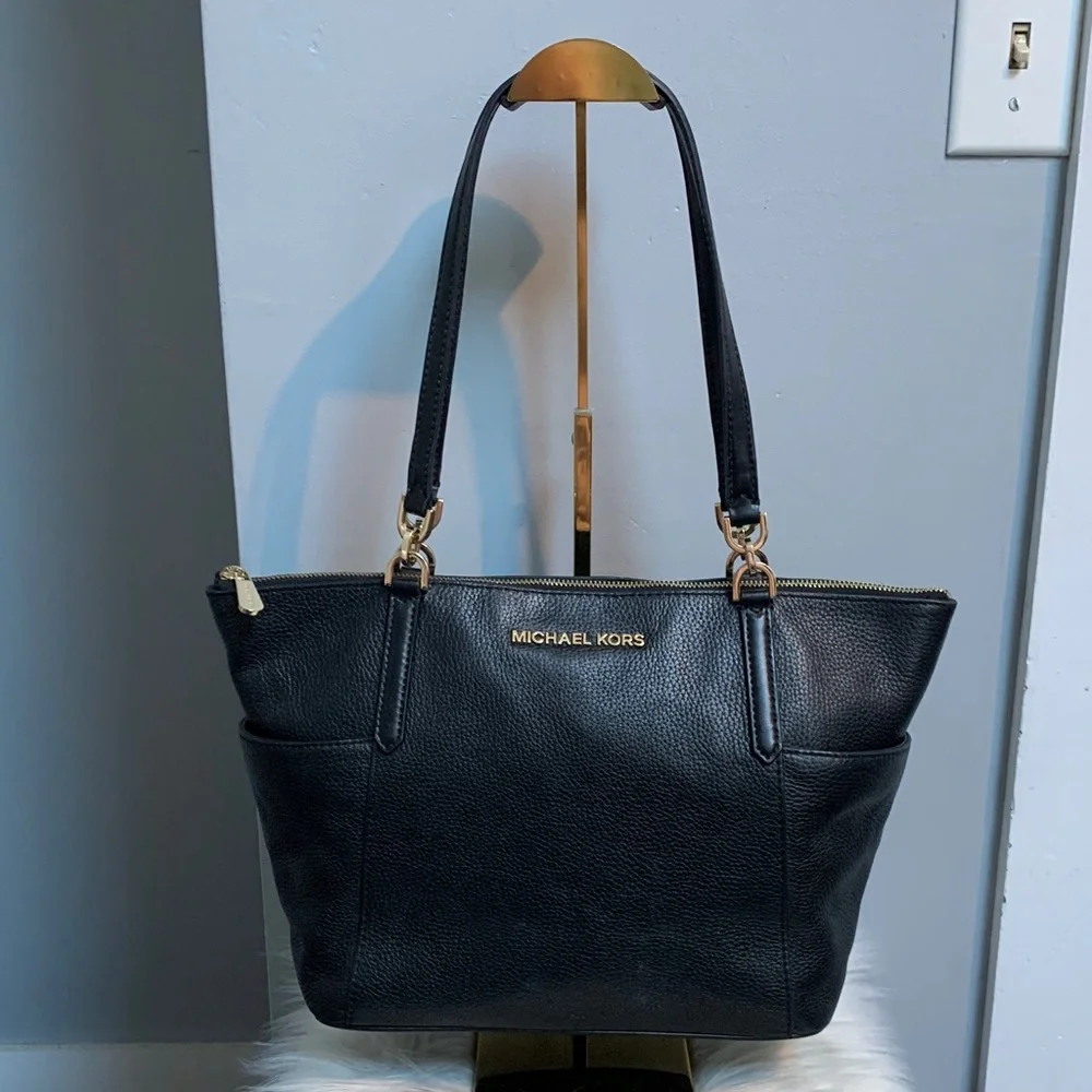 Authentic Michael Kors black leather tote bag with two exterior pockets