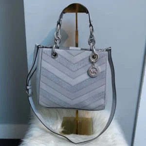 Authentic Michael Kors Cynthia gray and silver leather handbag w crossbody strap