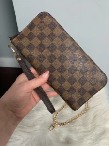2009 authentic Louis Vuitton Insolite wristlet in Damier Ebene