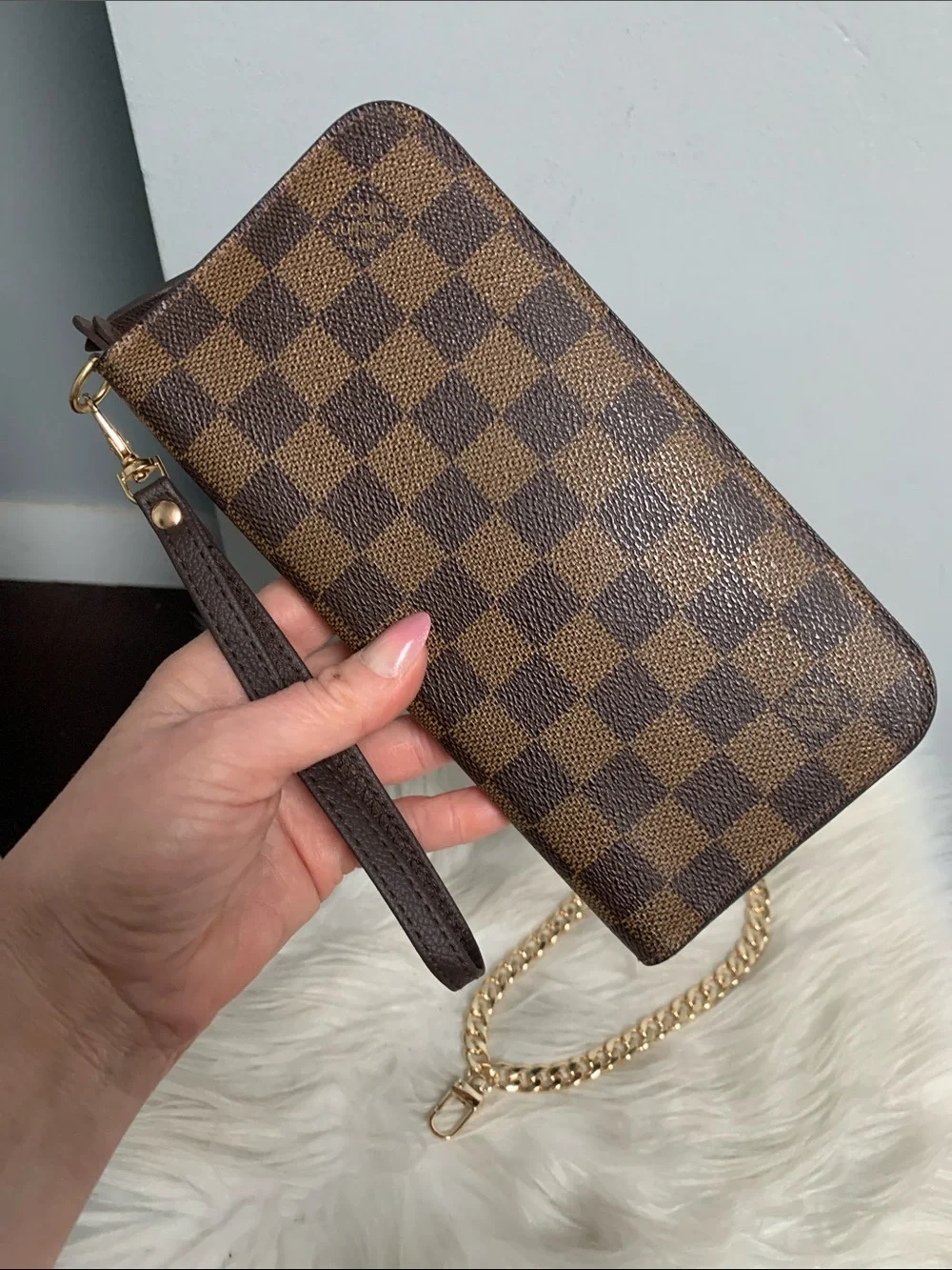 2009 authentic Louis Vuitton Insolite wristlet in Damier Ebene